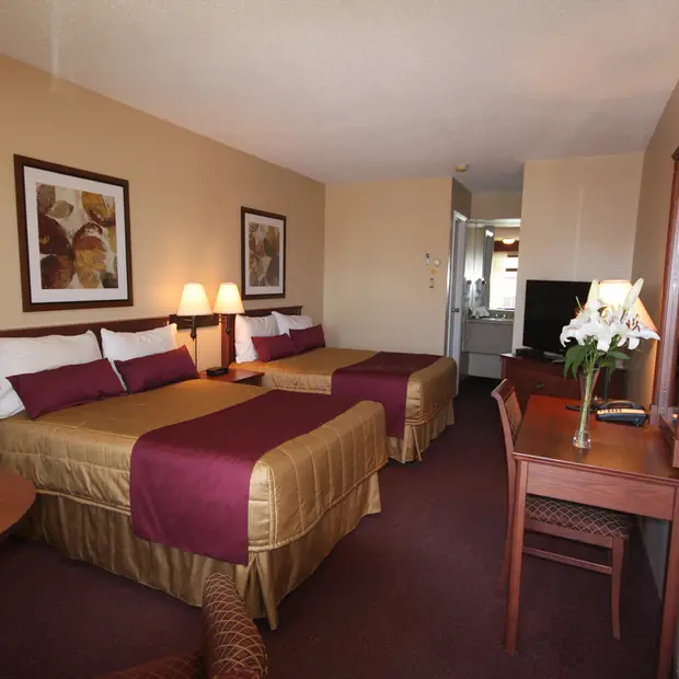 Chambre deux lits doubles